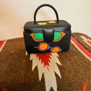 Silkscapes vintage makeup case.